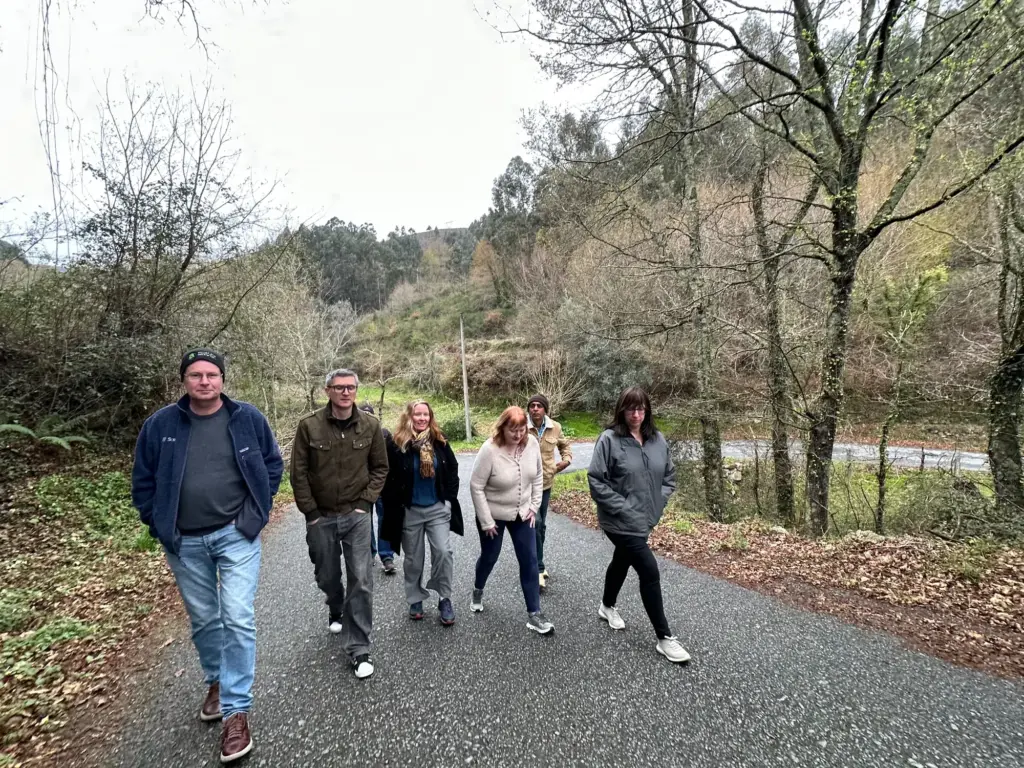 The group walking together down a country lane