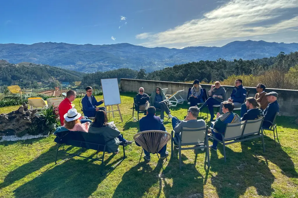 Operators settled into sofas in a lodge, sharing stories